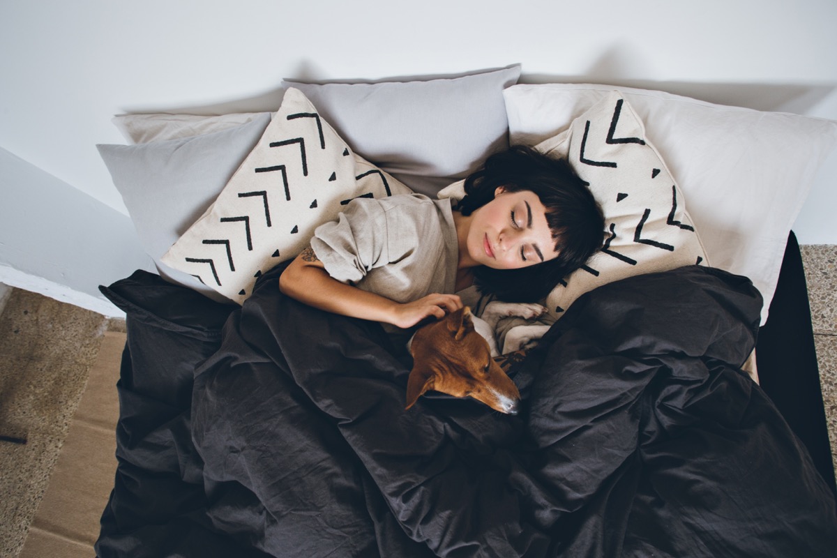 woman-in-bed-with-dog.jpg