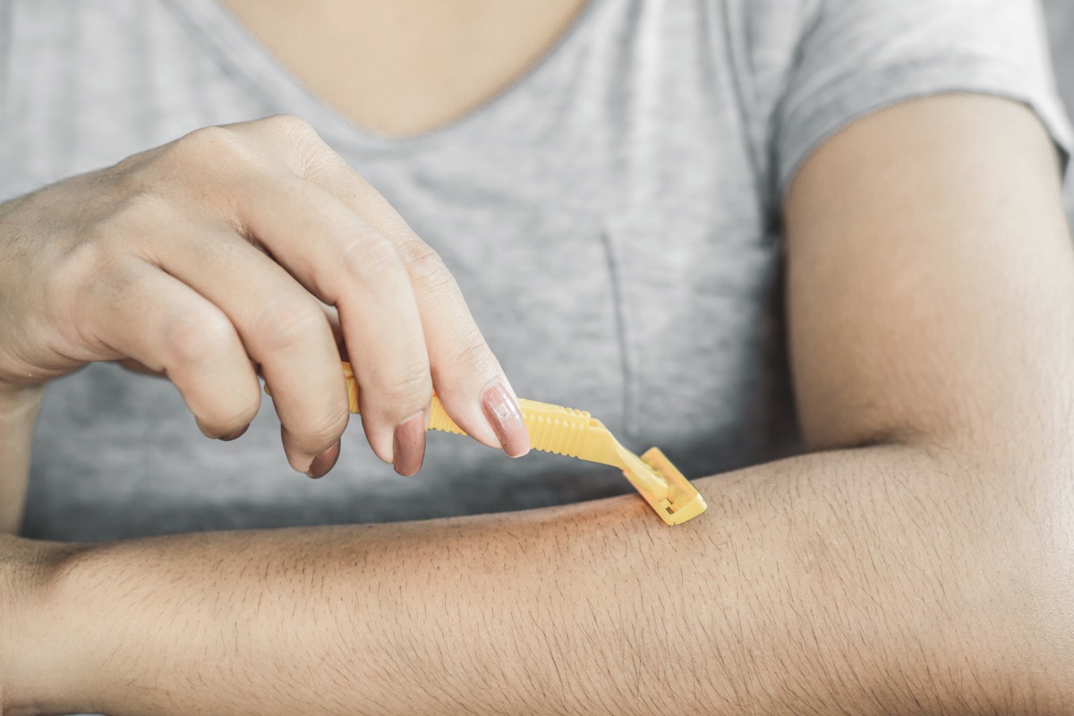 woman-shaving-her-arm-hair.jpg